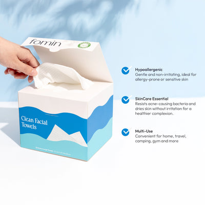 Hand pulling towel from box, with feature callouts