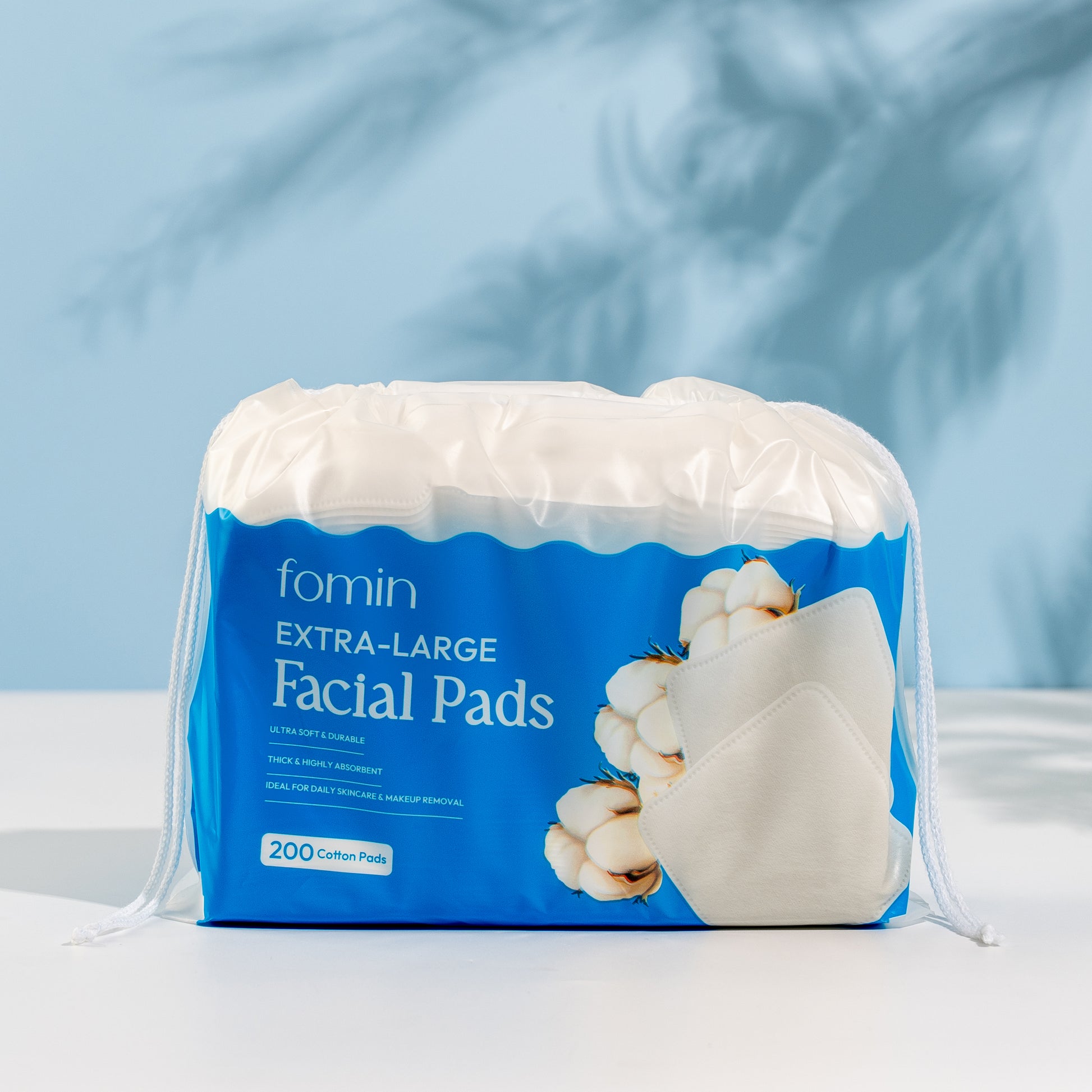 Fomin Extra-Large Facial Pads packaging on a light blue background